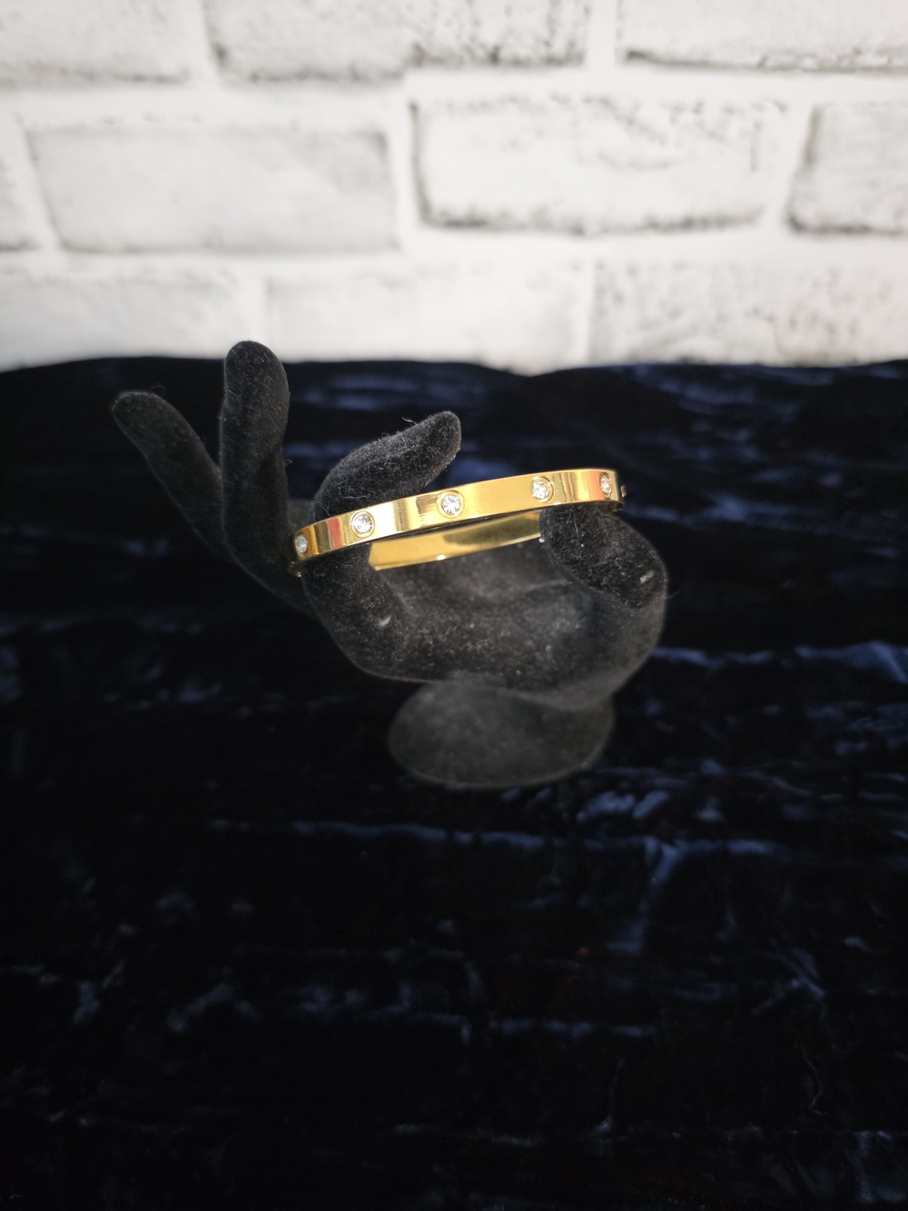 Gold Tone Bangle Bracelet with Crystal Accents